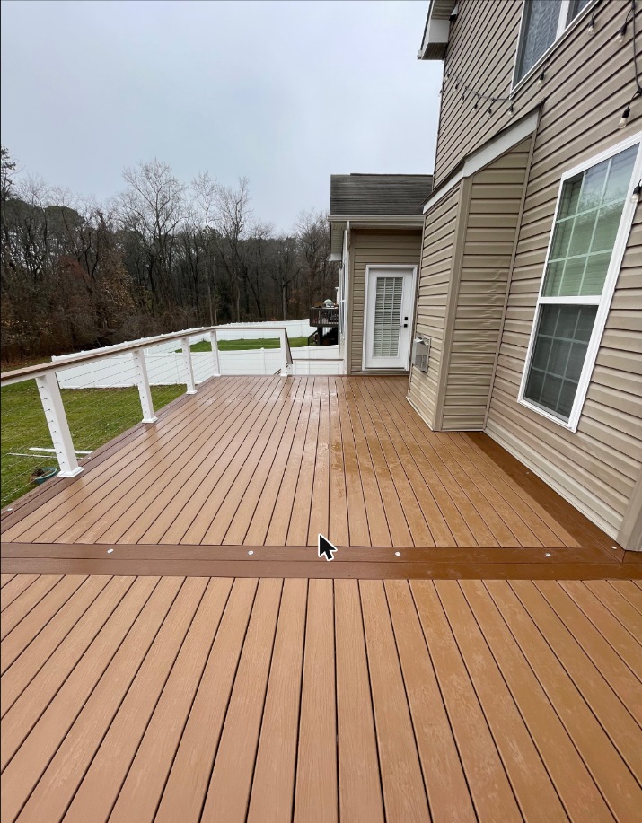 Composite deck with cable railing in Grasonville, MD — Assured Contracting Company