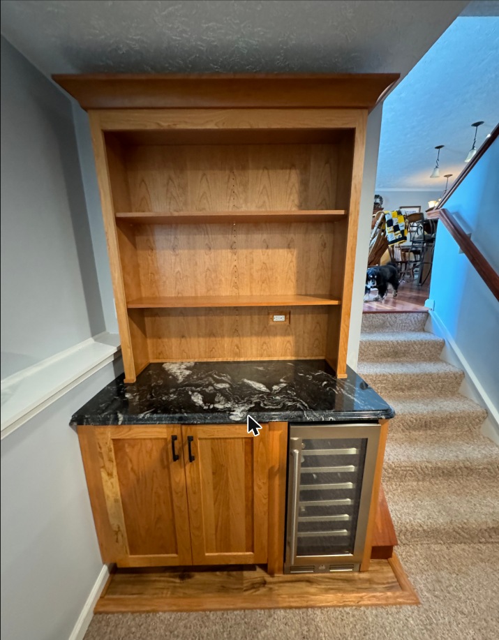 Custom wet bar cabinet with wine cooler in Grasonville, MD — Assured Contracting Company
